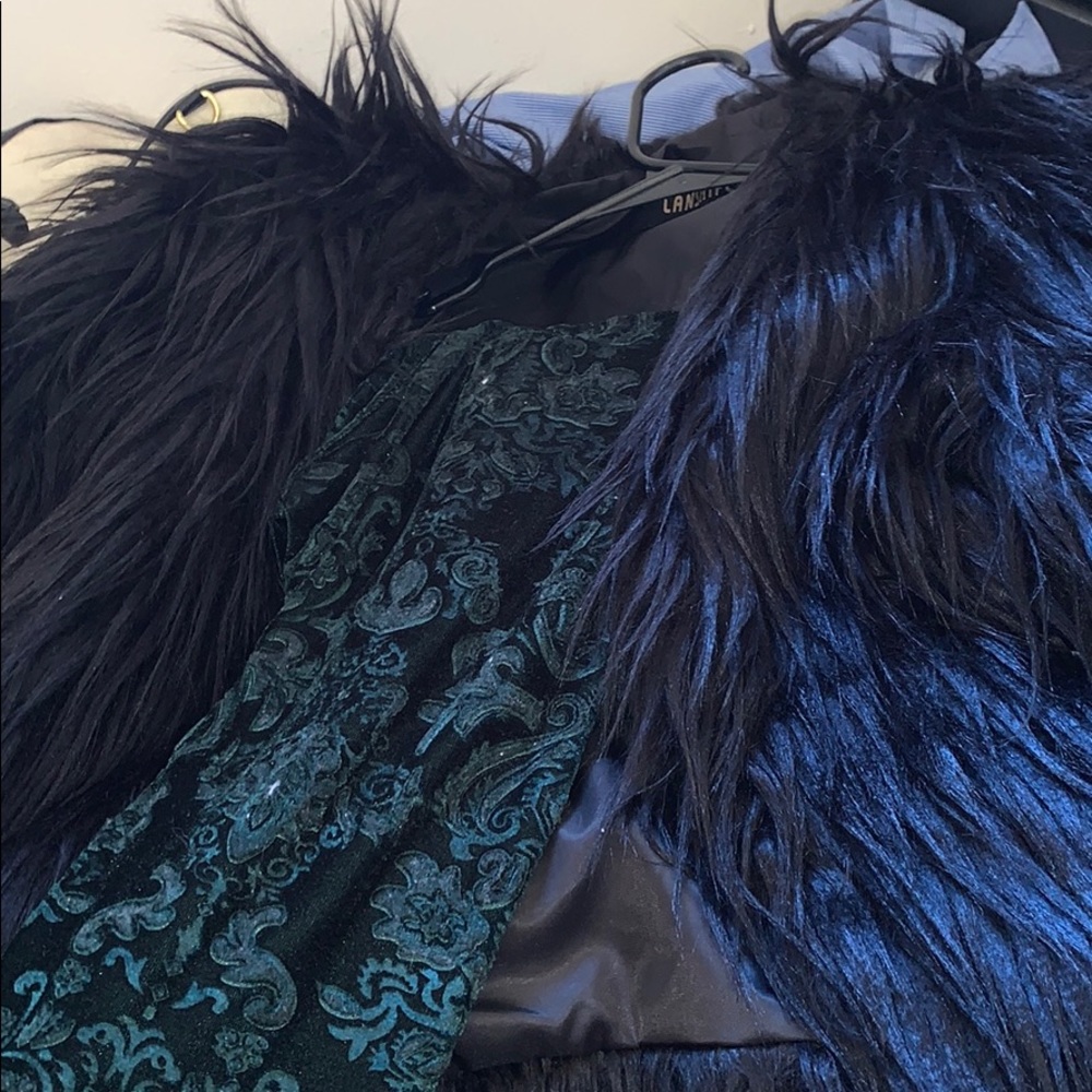 Fur coat and dress pants